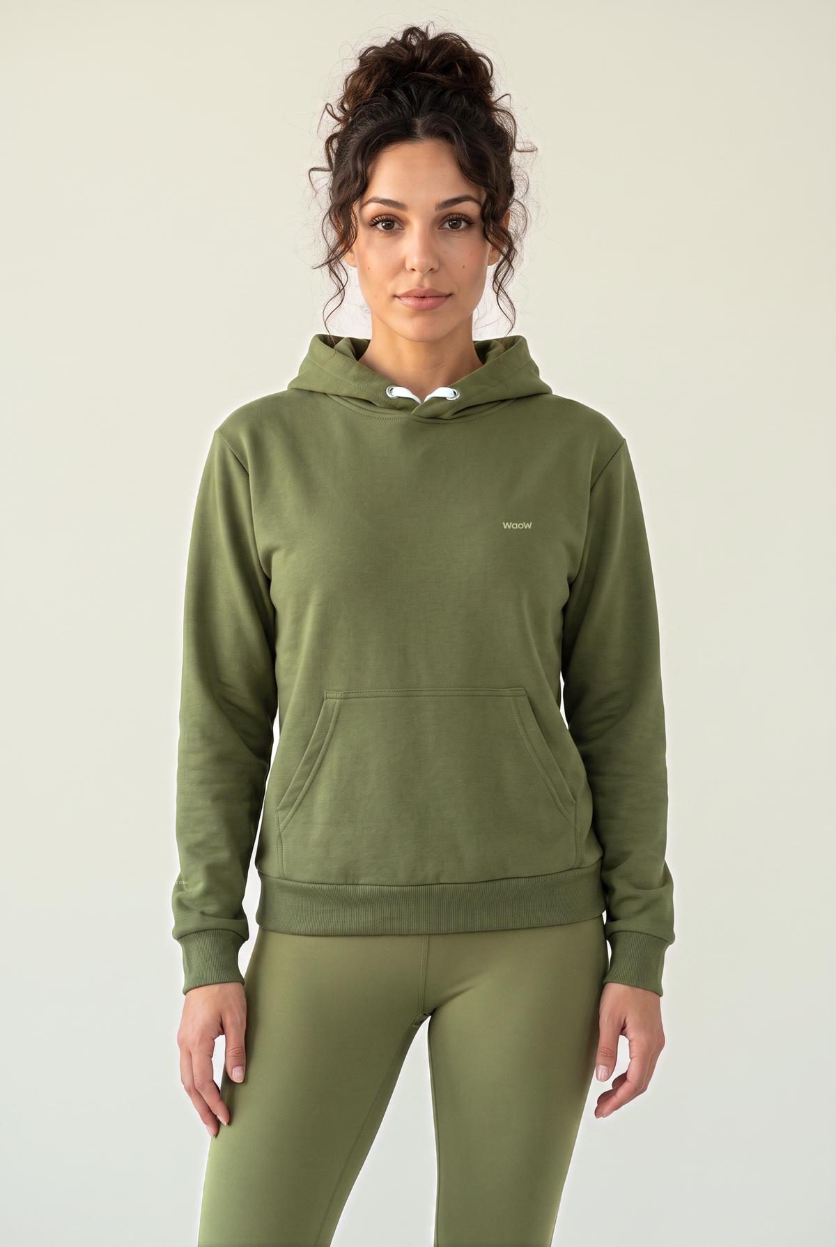 WaoW Recycled Hoodie, RAW Burnt Olive, worn with the matching leggings, front